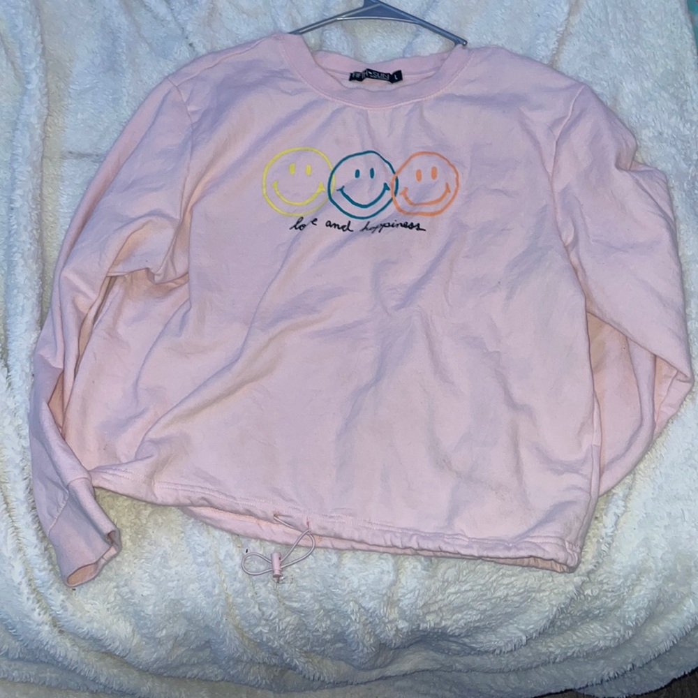 pink smiley face crew neck sweatshirt